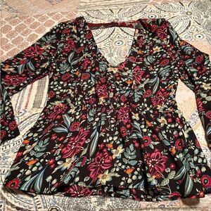 Long sleeved peplum top